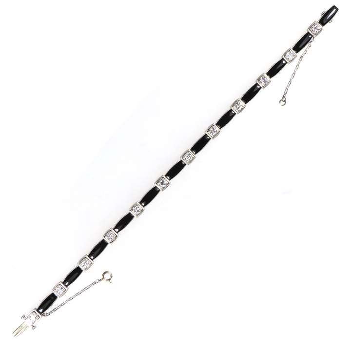 Early 20th century onyx and diamond line bracelet